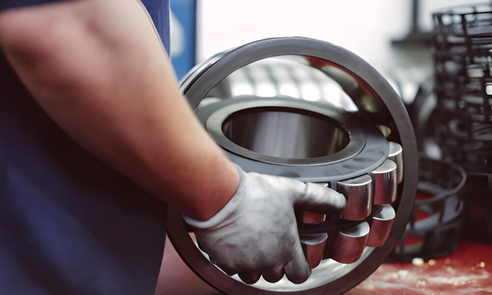 Industrial bearings made from different materials used in machinery under varying conditions like heat, load, and corrosion.